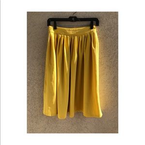 ASOS yellow pleated skirt